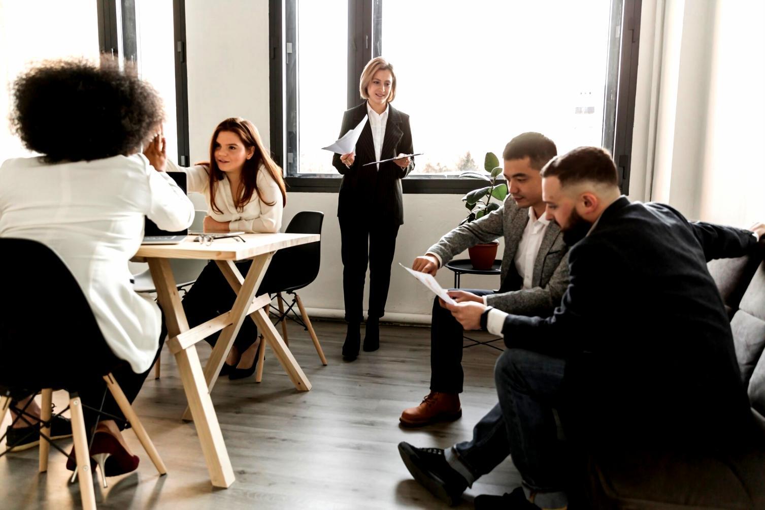 Business professionals analyzing startup growth metrics and financial planning strategies